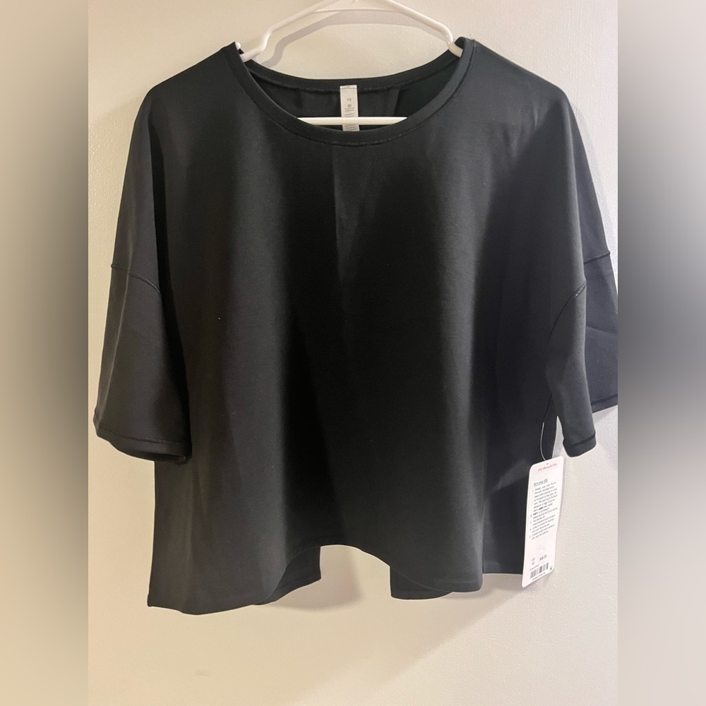 Never worn LuLuLemon Minimal Short Sleeve black crop top.